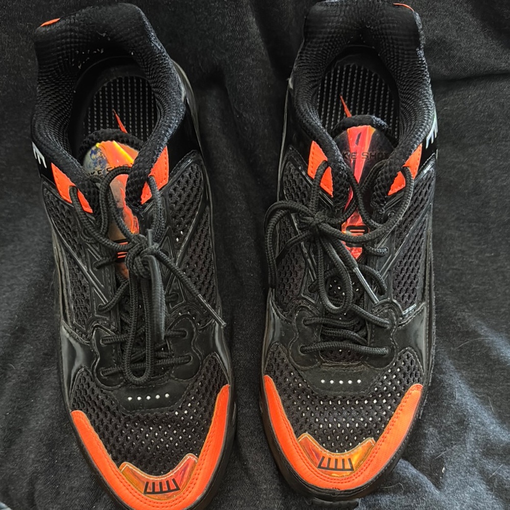 Stylish Black and Orange Women’s Nike Shox